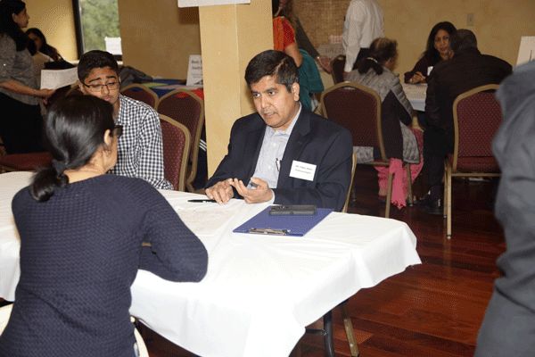 A local resident consults one-on-one with volunteer endocrinologist