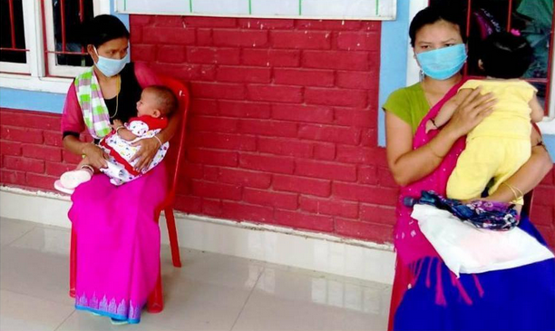 Women and their babies waiting to be seen at the mobile clinic.