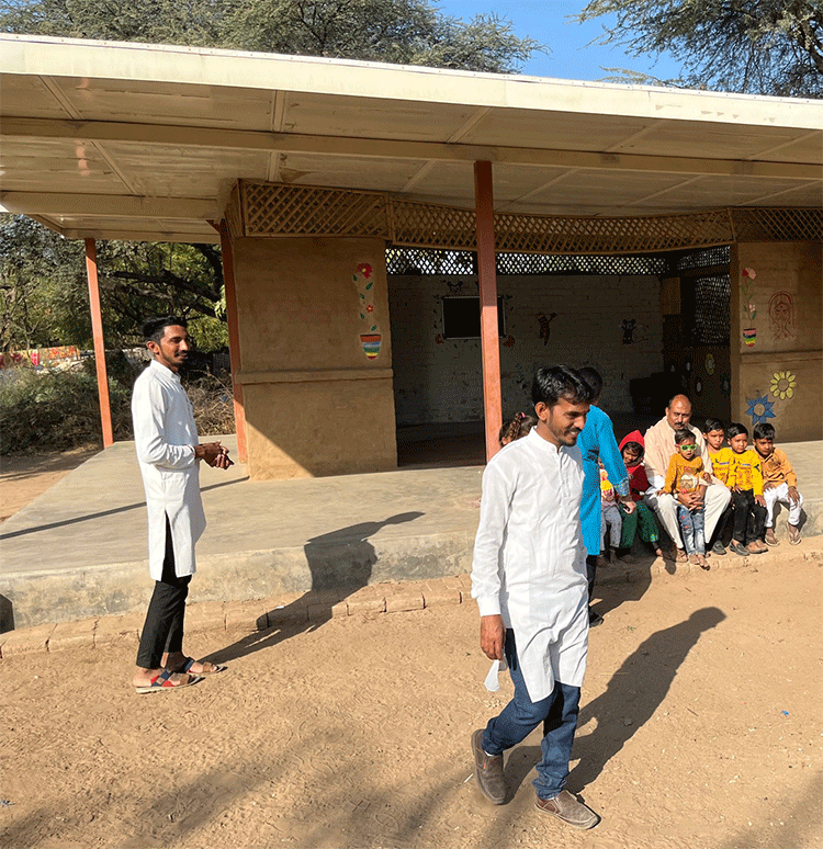 Village children visit Lokmitras and are able to enjoy a meal with them.