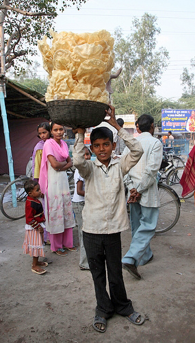 Young child working as a vendor.